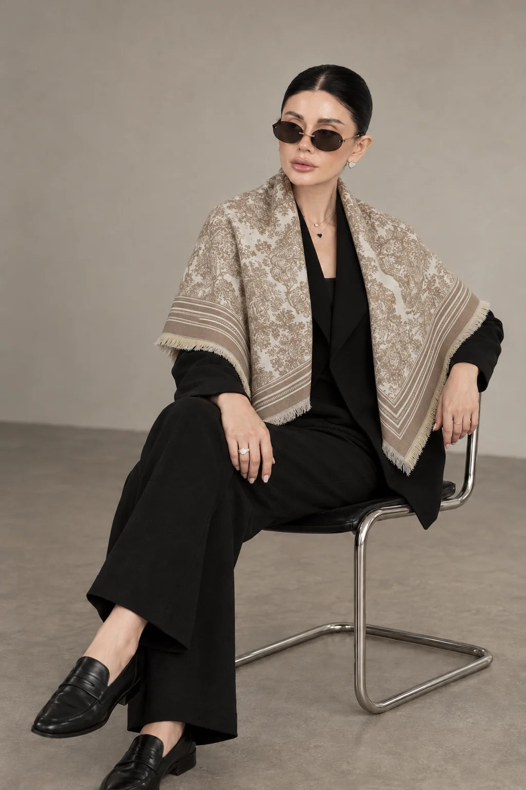 BEIGE cashmere animal print square shawl folded into a triangle — seated