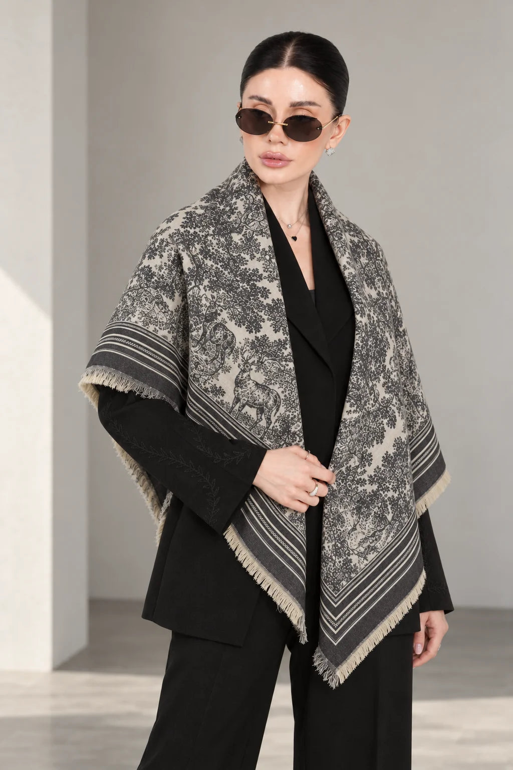 GREY cashmere animal print square shawl folded into a triangle — standing