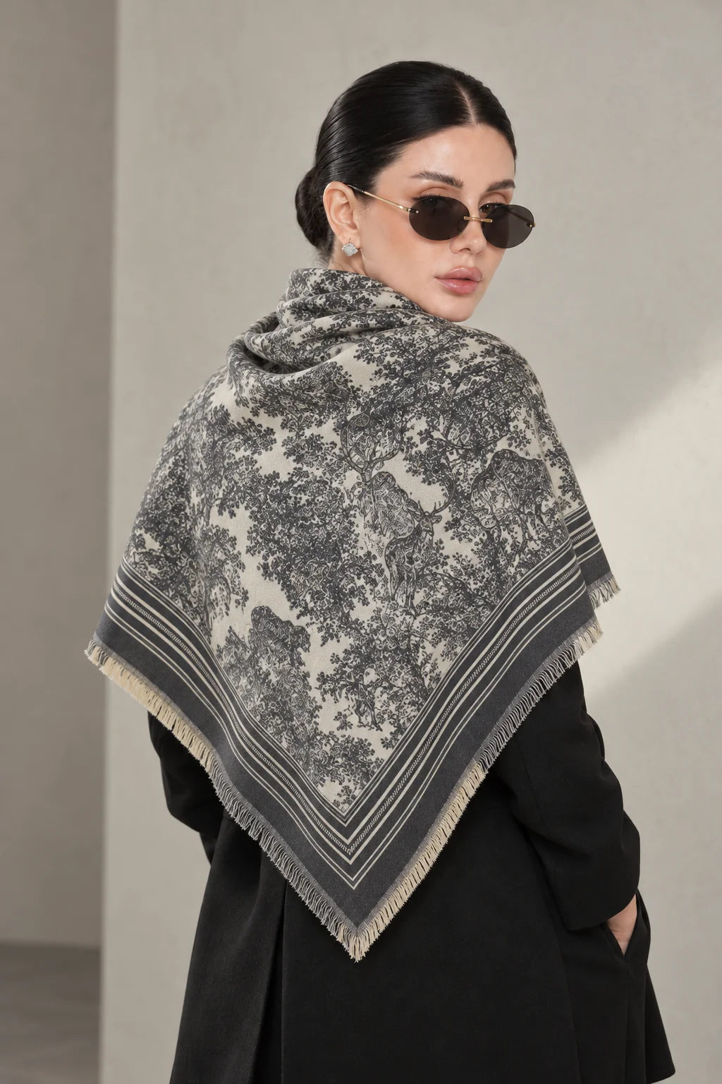 GREY cashmere animal print square shawl folded into a triangle — triangle-back