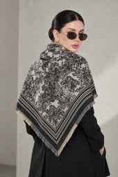 BLACK cashmere animal print square shawl folded into a triangle — triangle-back