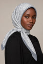 Silk Silver Botanical Murabba Scarf, 90×90 cm square hijab in Kuwait — closeup portrait